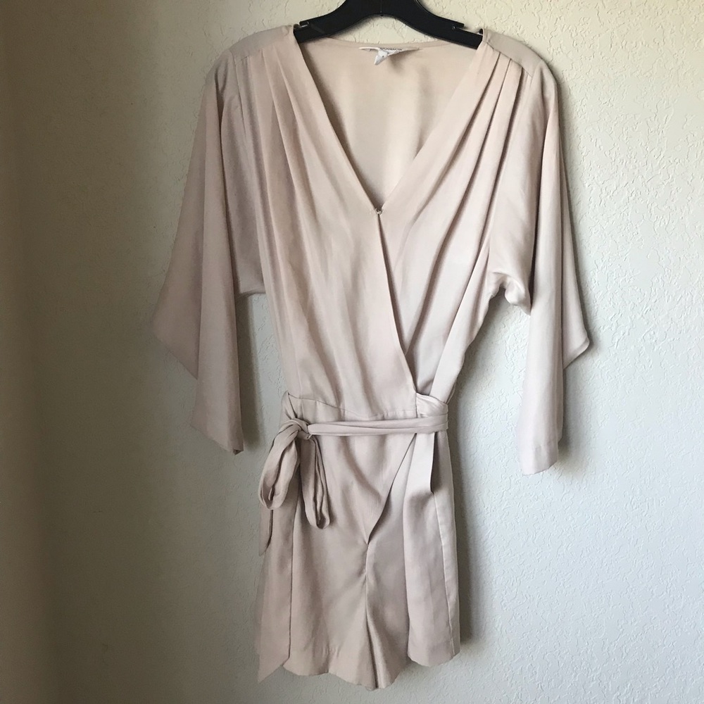 BCBG cream romper size 4